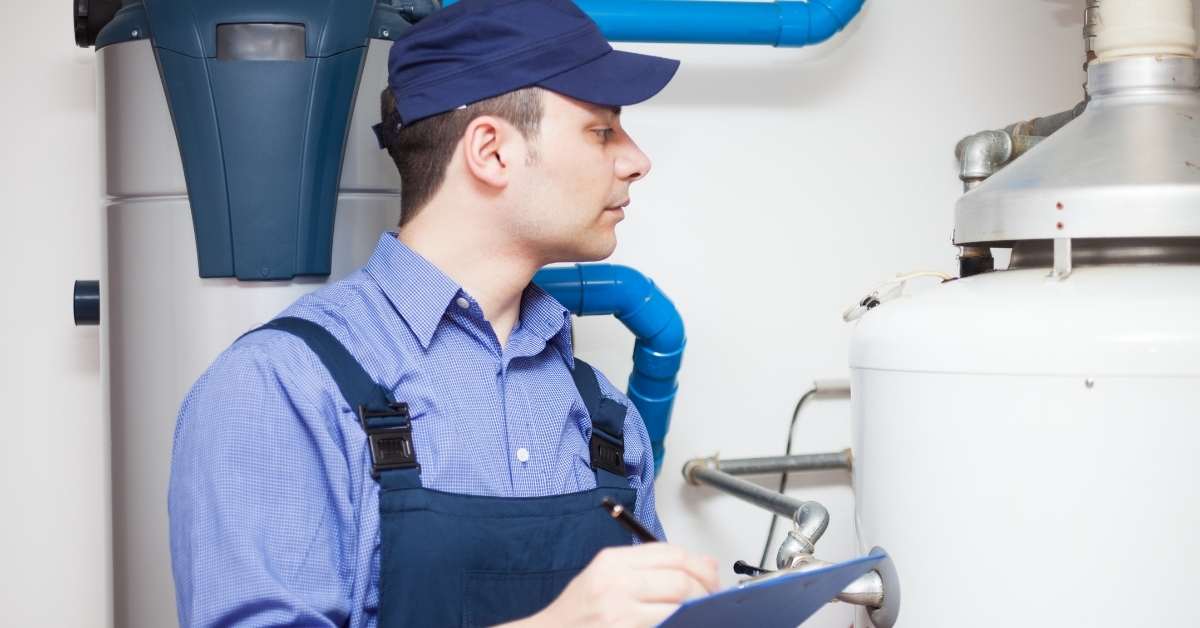 Broward Water Wastewater Services man checking tank