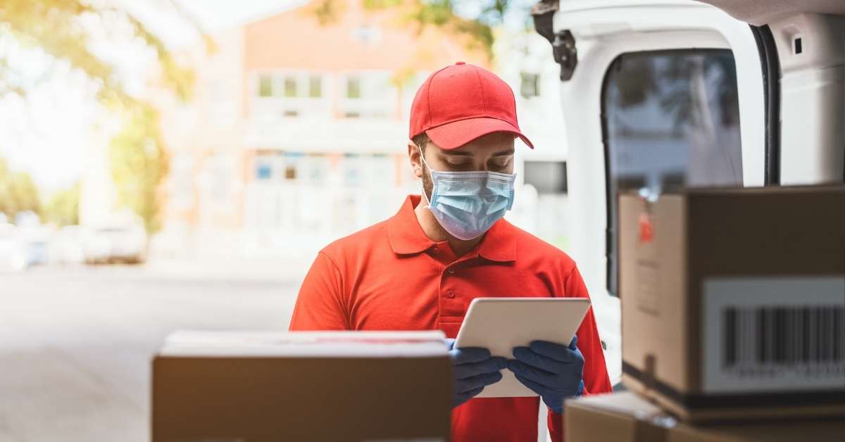 man checking parcels